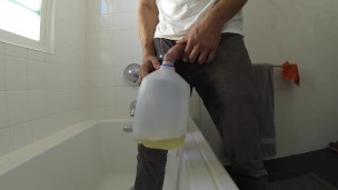Pissing jeans outdoors 5 times and pouring piss all over myself
