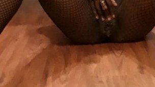 Wet pussy play in fishnets