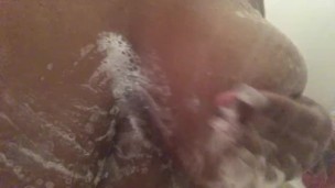 Big titties getting wet in the shower