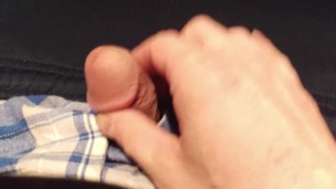 Masturbation through boxer shorts