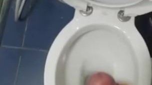Spraying the bathroom floor.