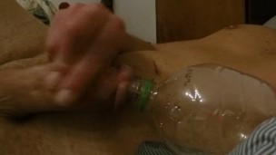 Cumming into a bottle