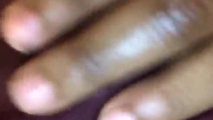 Busty Ebony plays with fat clit