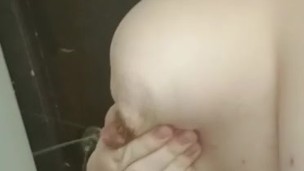 Hand expressing my breastmilk