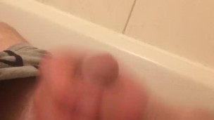 Master pouring piss on his hard cock