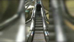 Wearing Latex on public escalator