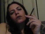 femdomme smokes in bra
