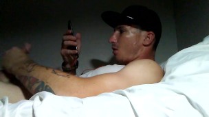 Tattooed white boy masturbates watching porn
