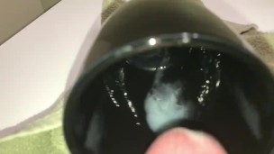 cum shot into a black coffee cup (Failed Slowmo)