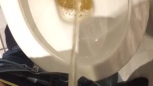Young twink pissing