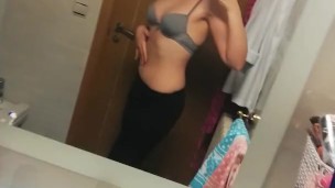 Redhead Strips in front of a Mirror