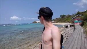 Russian teen walks on the beach and shows his cock in public, but he was seen
