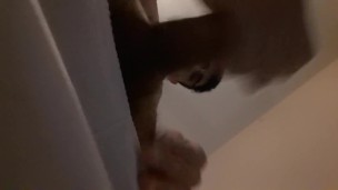Masturbating