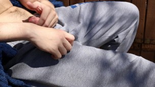 Cumming outside while neighbors watch