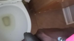Pissing on hand and floor at work