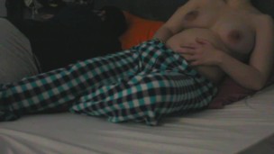 Preggo woman loves to masturbate and orgasm near her husband in bed