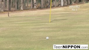 Cute Asian teen girls play a game of strip golf