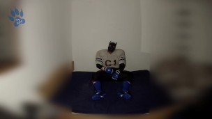 Rufus pawing off in Football Gear