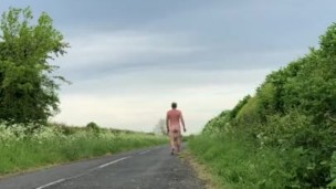 Long naked walk down the street/road