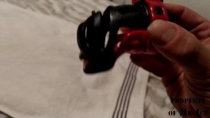 Boi Locking on a Chastity Cage w Bell