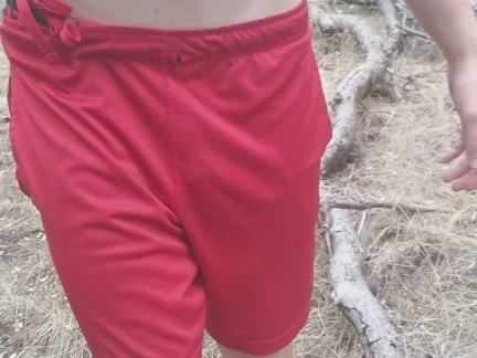 Broken Red Shorts by the River