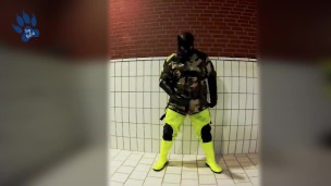 Pawing off in camo painter's overall and hi-viz waders