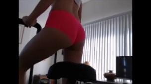 Milf WorkOut. Tara Smith Riding Stationary Bike Exercising. Side Boob & Ass
