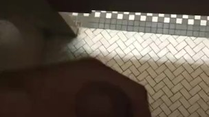 Jacking off in public restroom