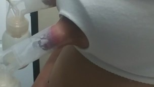 Pumping my milk. Breast milk