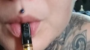 Smoking sexy eyes face tattoos