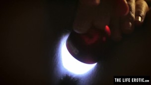 Sleepless girl rubs her clit at night with a hand held light