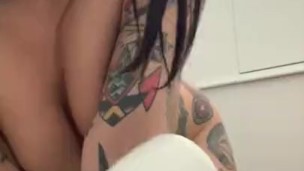 Onesie Wearing Tattooed Slut Masturbates with Hitachi Wand