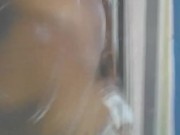 Having fun in the shower dancing and soaping up, ( Jamaican)