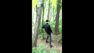 Bad boy jerks while smoking cigarette in a forest - almost caught - so his balls stay full