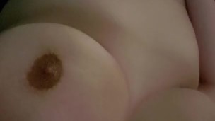 Chubby teen plays with big tits and pussy