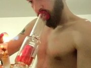 Shirtless bong rip