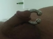 male pissing with large cockring