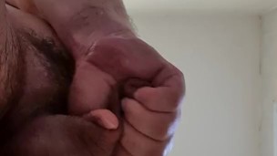 View from directly below. Jerking off still wet from the shower.