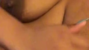 Bored Ebony Plays with Nipples