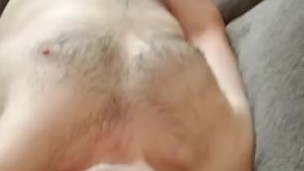 Jerking off on the couch and spraying cum all over myself