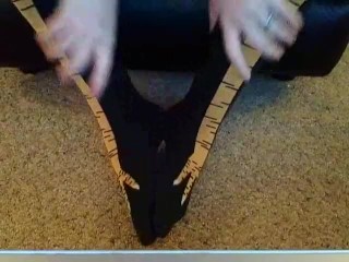 Becky putting on chicken socks