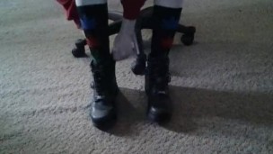Becky putting on socks and Harley boots