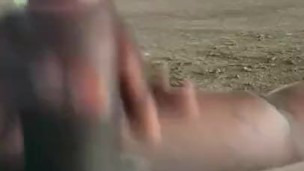 Jerking under bridge (cumshot)