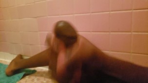 In the bathroom playing with my black cock