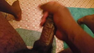 Playing with my fat black cock