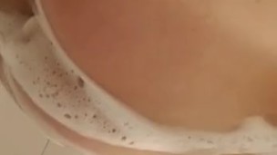 Soapy shower watch the foam slip over my ass