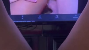 Rubbing pussy watching gangbang porn