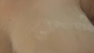 Soaping up my big tits in the shower