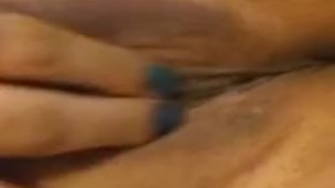 Thick Brown girl finger fucks her wet pussy.