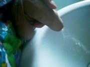 Uncut cock gets semi while pissing!